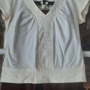 Beautiful cream color short sleeve blouse